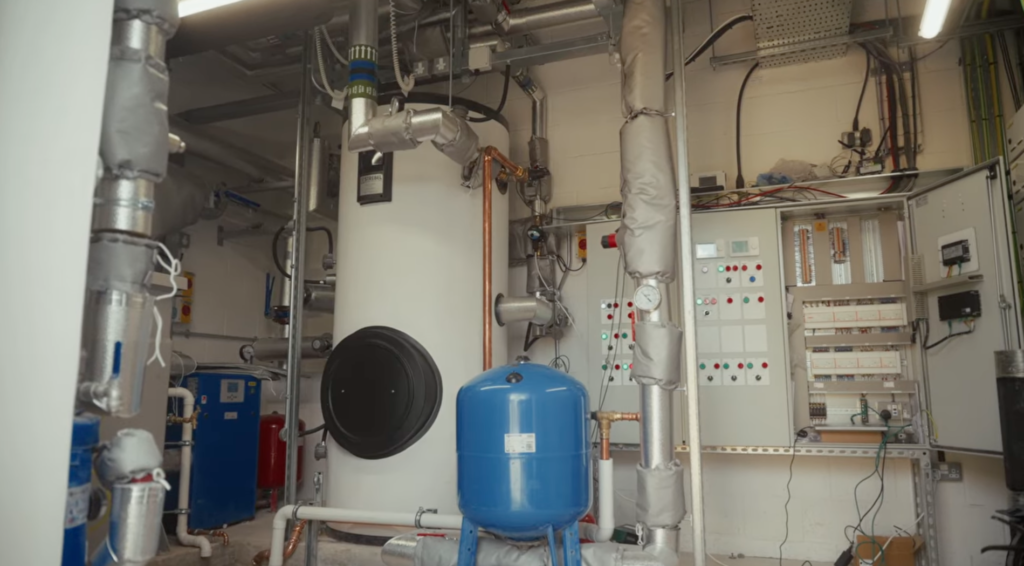 he indoor Strebel SLCI 1,000L calorifier integrated into the hydronic setup.